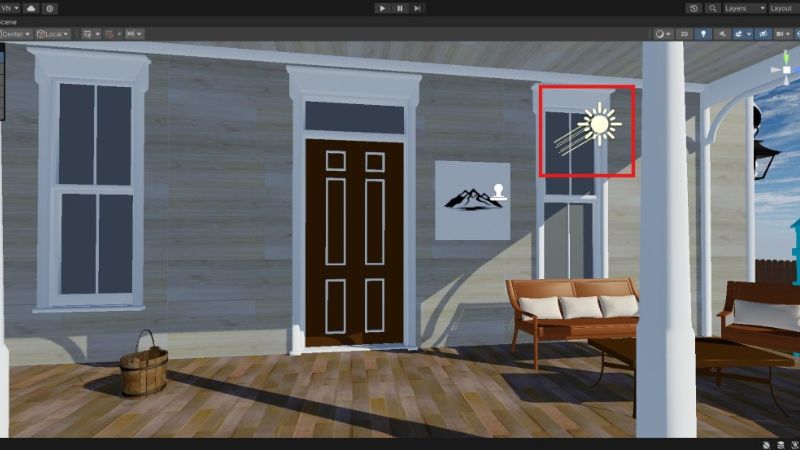 A directional light gizmo surrounded by a red square in front of a house in Unity.