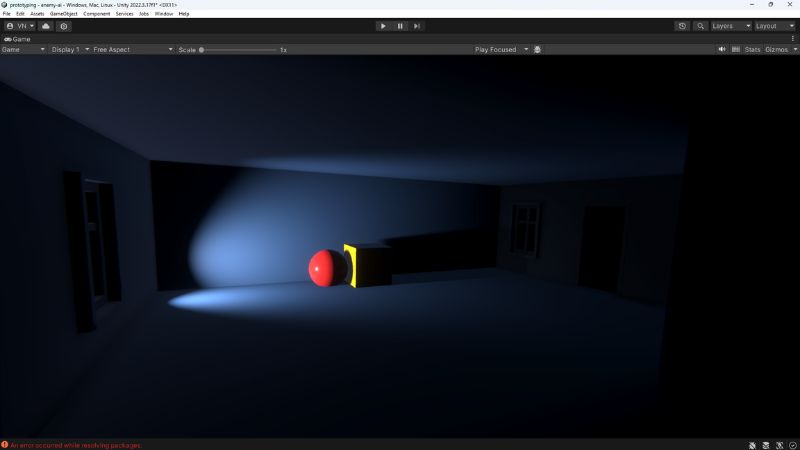 A spot light illuminating a red ball and yellow square in Unity.
